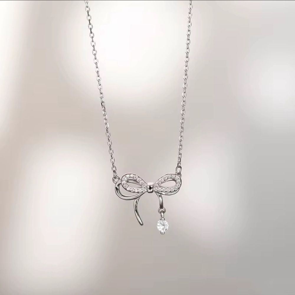 Silver Bow Pendant Necklace